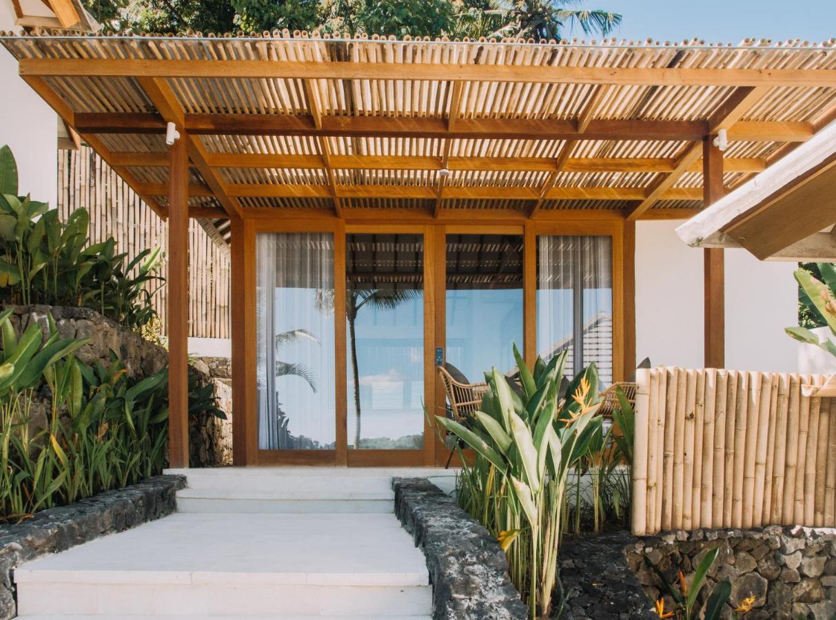 Neano Escape Hotel Manggis  ภายนอก รูปภาพ A villa at the resort