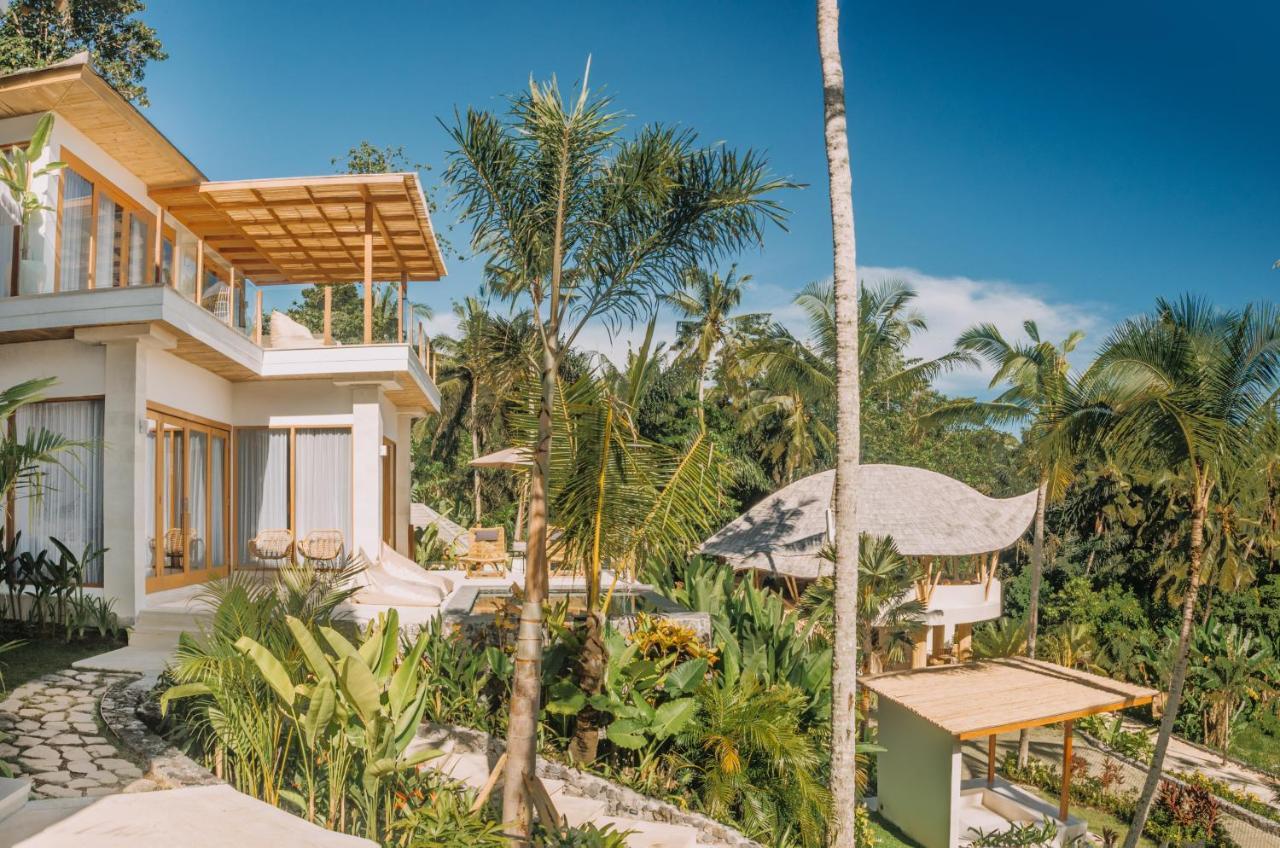 Neano Escape Hotel Manggis  ภายนอก รูปภาพ The resort's villas