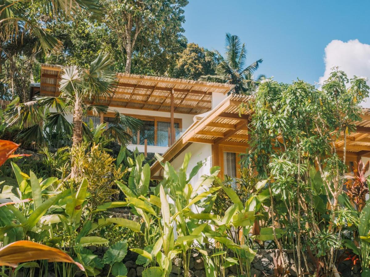 Neano Escape Hotel Manggis  ภายนอก รูปภาพ The resort's villas