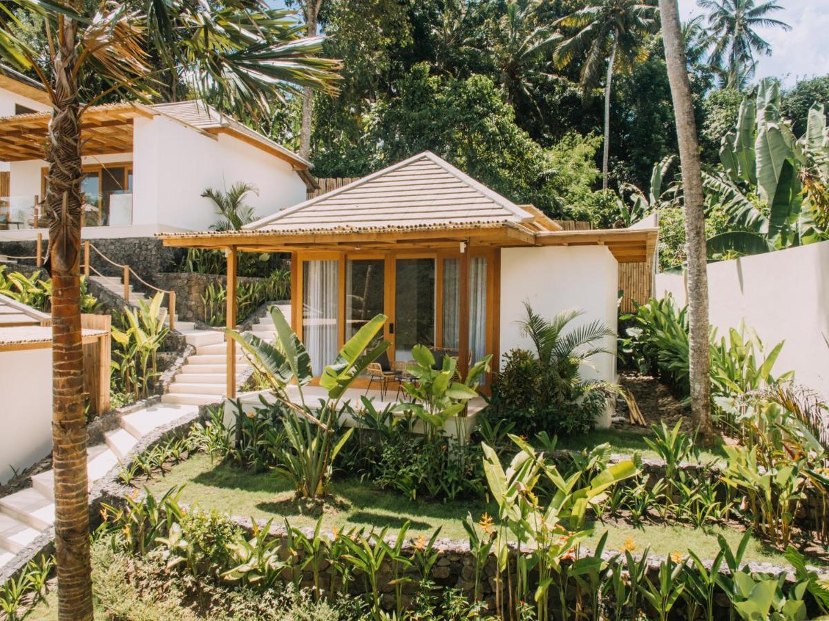 Neano Escape Hotel Manggis  ภายนอก รูปภาพ A villa at the resort