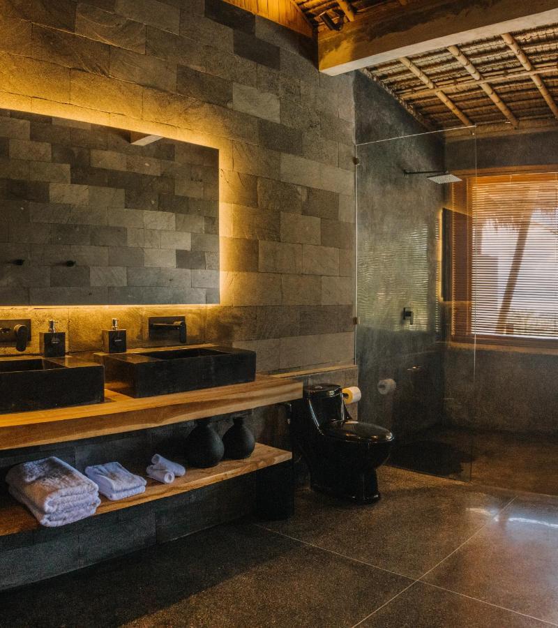 Neano Escape Hotel Manggis  ภายนอก รูปภาพ Bathroom at the hotel