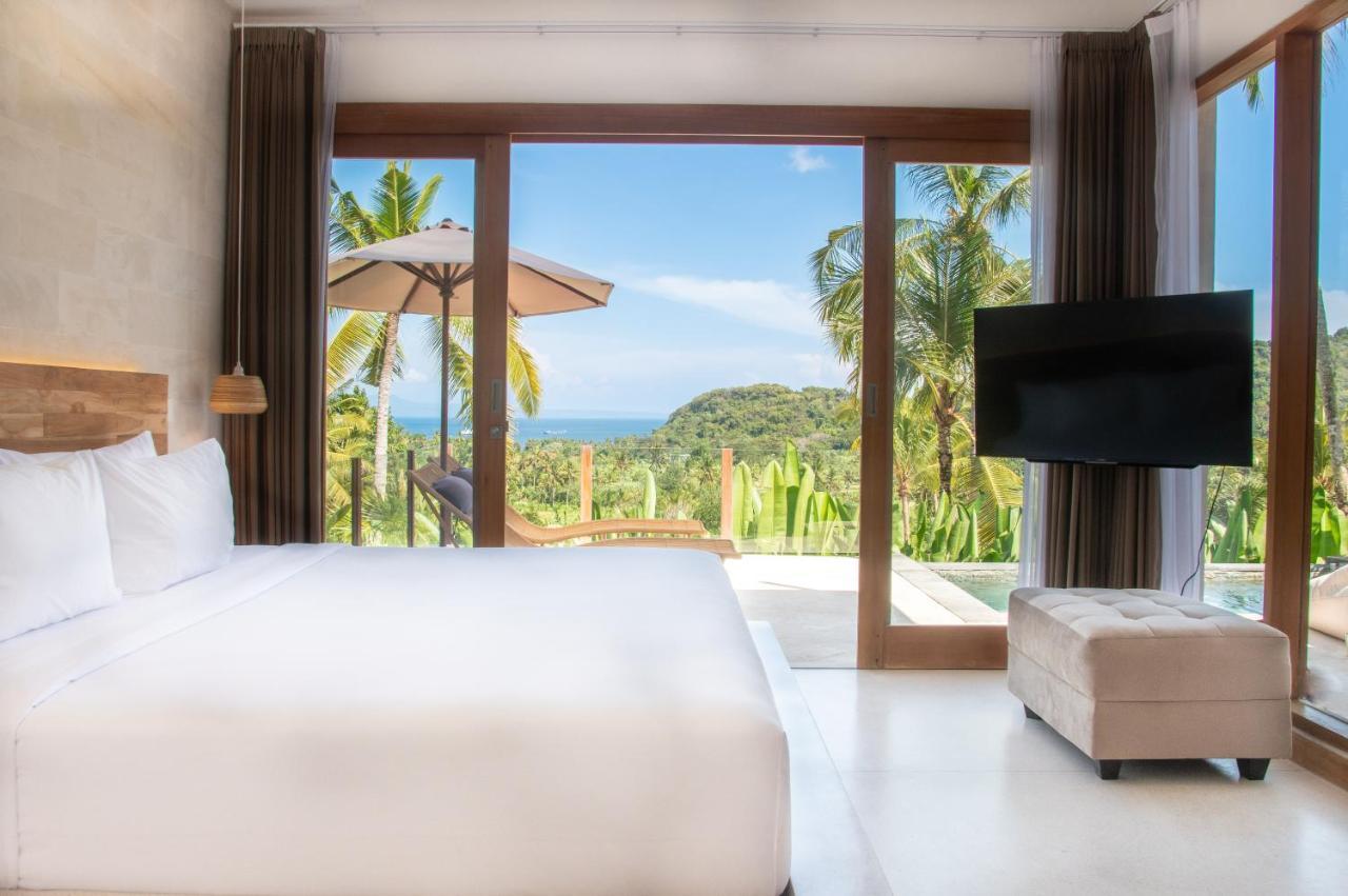 Neano Escape Hotel Manggis  ภายนอก รูปภาพ A bedroom at the resort